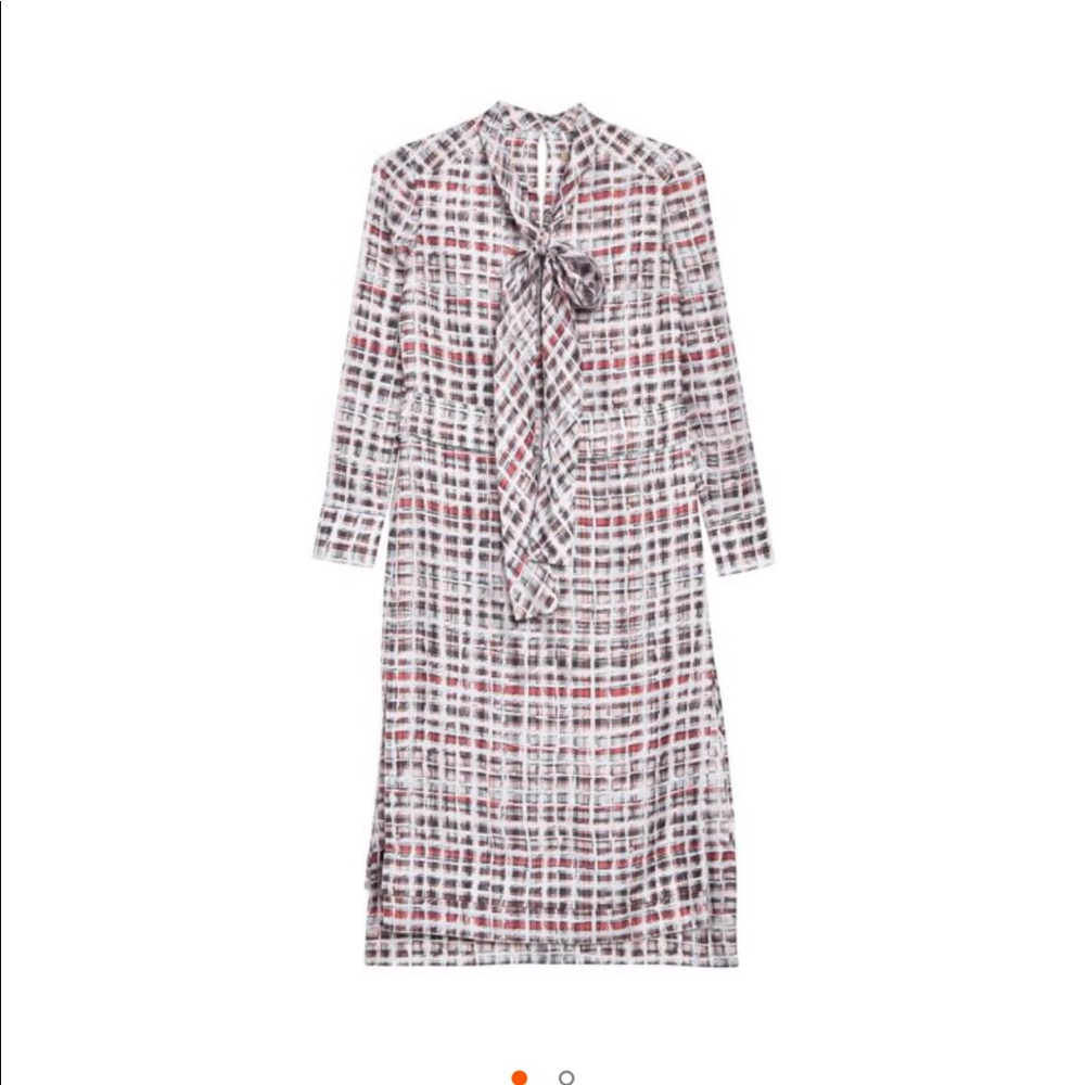 Silk Burberry dress brand new with minor one inch tear in seam.